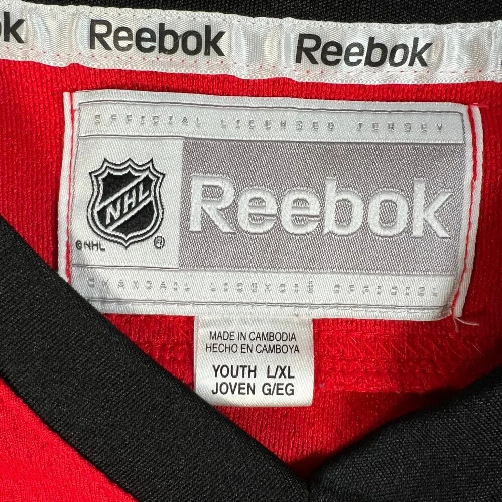 Reebok Chicago Blackhawks NHL Andrew Shaw #65 Red Jersey Youth Sz L/XL - Picture 2 of 12
